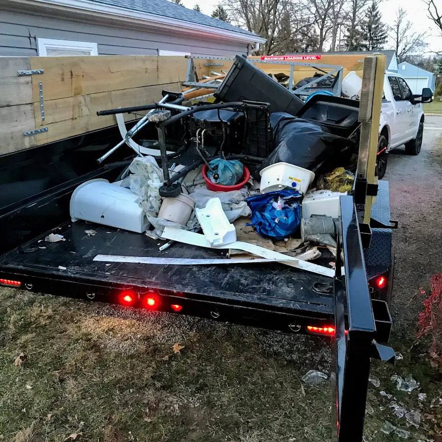Roll-off dumpster delivered to a residential driveway in Summit